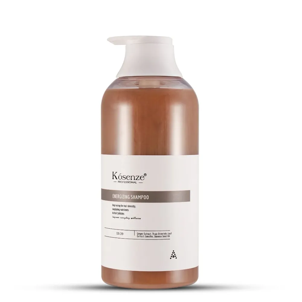 Front label of bottle Kósenze Energizing Shampoo showing a sage green accent stripe and ginger ingredients.