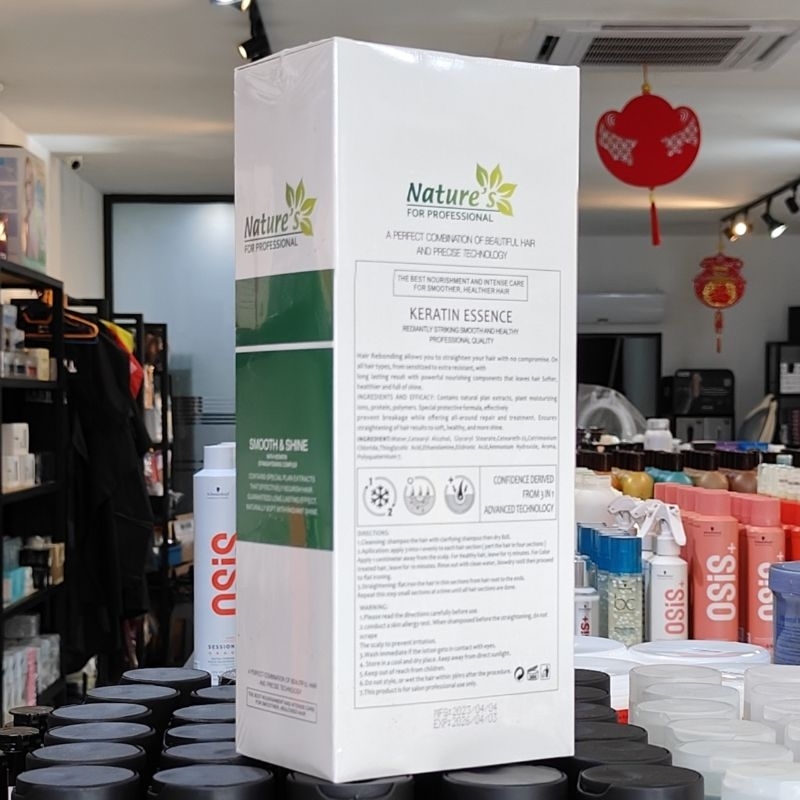 back label of Nature's For Professional Hair Rebonding Keratin Essence 1000ml white and green packaging box in a retail store.
